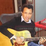 Carlos Huertas Jr Tocando la Guitarra - lachachara.org